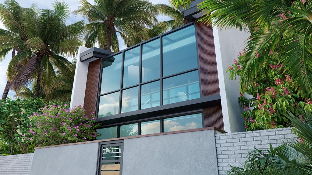 Modern tropical house surrounded by palms